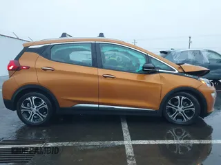 2017 Chevrolet Bolt EV Premier with VIN 1G1FX6S02H4131210, listed as a IAAI auction lot 41238714 with 97,613 mi miles and . Bid and sale history available at DreamBid. Image 13.