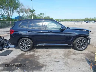 2021 BMW X3 sDrive30i z VIN 5UXTY3C00M9G70296, wystawiony jako IAAI lot #42295882 z przebiegiem 28 895 mil mil oraz . Historia ofert i sprzedaży dostępna na DreamBid. Obrazek 14.