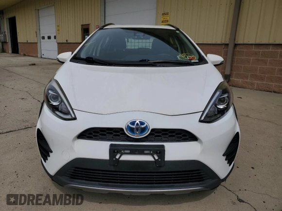 2018 Toyota Prius One z VIN JTDKDTB38J1615672, wystawiony jako Copart lot #53270015 z przebiegiem 55 974 mil mil oraz Czysty tytuł • Clean title. Historia ofert i sprzedaży dostępna na DreamBid. Obrazek 5.