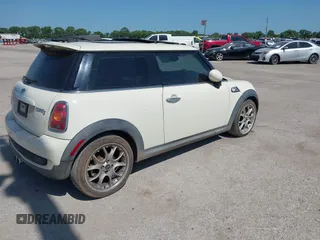 2007 MINI Hardtop S with VIN WMWMF73517TL83792, listed as a IAAI auction lot 42680017 with 135,631 mi miles and . Bid and sale history available at DreamBid. Image 4.