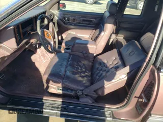 1988 Cadillac Eldorado with VIN 1G6EL1153JU632470, listed as a Copart auction lot 78507684 with 176,894 mi miles and Salvage Title. Bid and sale history available at DreamBid. Image 7.