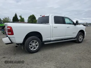 2023 Ram 2500 Laramie with VIN 3C6UR5FJ1PG634158, listed as a Copart auction lot 57164505 with 18,279 mi miles and Salvage title. Bid and sale history available at DreamBid. Image 3.