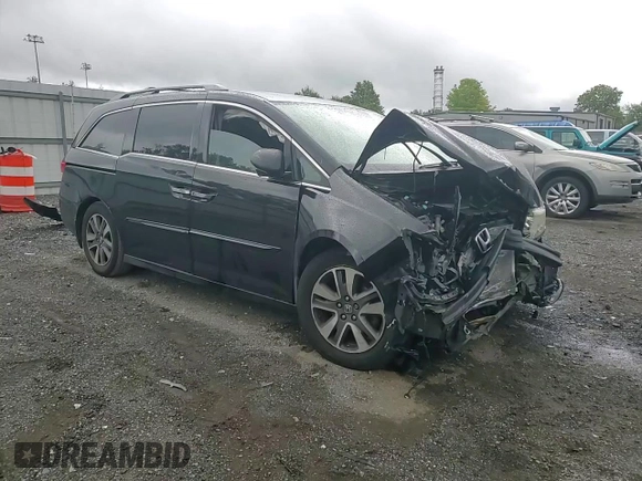 2014 Honda Odyssey Touring with VIN 5FNRL5H95EB056118, listed as a Copart auction lot 57729865 with Not provided miles and Salvage title. Bid and sale history available at DreamBid. Image 15.