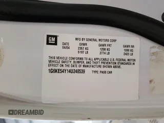 2004 Cadillac DeVille DHS z VIN 1G6KE54Y14U248539, wystawiony jako Copart lot #51995685 z przebiegiem 149 571 mil mil oraz Czysty tytuł • Clean title. Historia ofert i sprzedaży dostępna na DreamBid. Obrazek 13.