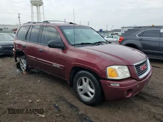 2004 GMC Envoy SLE with VIN 1GKDT13S942218982, listed as a Copart auction lot 81270034 with 197,954 mi miles and Salvage Title. Bid and sale history available at carsss.com. Image 4.