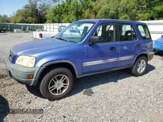 2000 Honda CR-V LX with VIN JHLRD1741YC052213, listed as a Copart auction lot 52323825 with 228,473 mi miles and Clean Title. Bid and sale history available at carsss.com. Image 1.