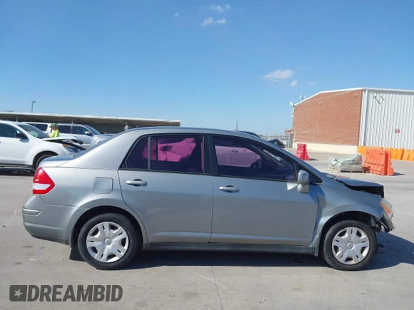 2010 Nissan Versa S with VIN 3N1BC1AP2AL394996, listed as a IAAI auction lot 40690760 with 125,972 mi miles and . Bid and sale history available at DreamBid. Image 14.