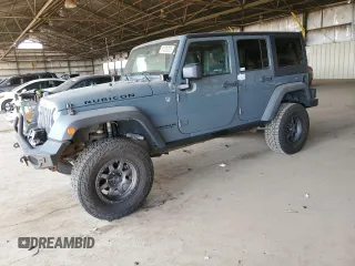 2014 Jeep Wrangler Unlimited Rubicon with VIN 1C4BJWFG4EL141706, listed as a Copart auction lot 51305235 with 106,919 mi miles and Salvage Title. Bid and sale history available at carsss.com. Image 1.