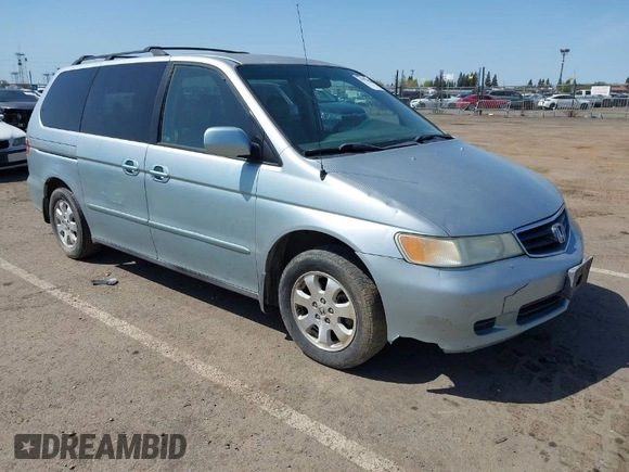 2003 Honda Odyssey EX with VIN 2HKRL18603H502236, listed as a IAAI auction lot 41929501 with 287,538 mi miles and . Bid and sale history available at DreamBid. Image 1.