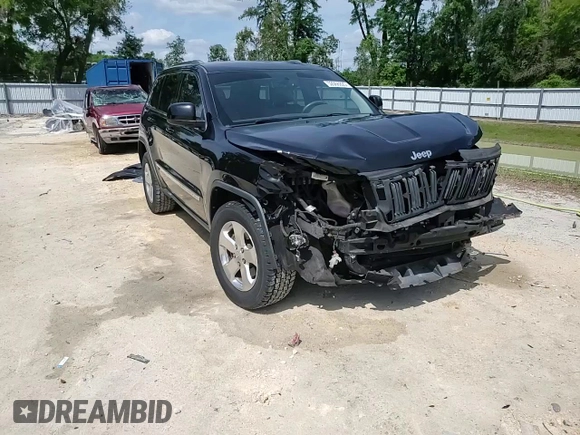 2013 Jeep Grand Cherokee Laredo with VIN 1C4RJEAG2DC519570, listed as a Copart auction lot 52066225 with 129,091 mi miles and Salvage Title. Bid and sale history available at carsss.com. Image 15.