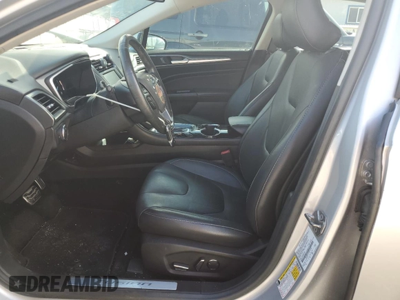 2016 Ford Fusion Titanium with VIN 3FA6P0SU1GR316318, listed as a Copart auction lot 56244015 with 73,451 mi miles and Salvage title. Bid and sale history available at DreamBid. Image 7.