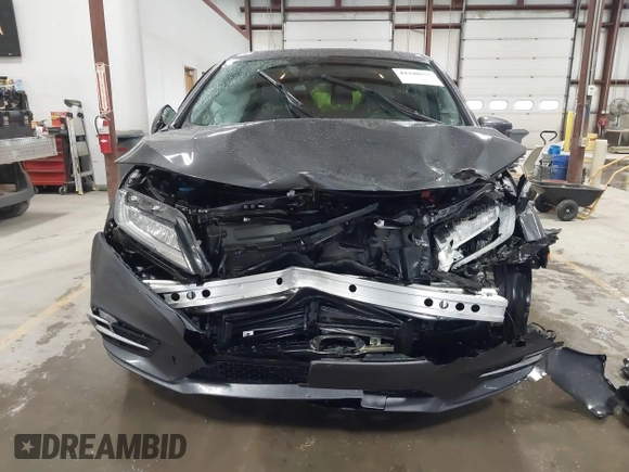 2020 Honda Odyssey Elite with VIN 5FNRL6H9XLB034814, listed as a IAAI auction lot 41940655 with 57,864 mi miles and . Bid and sale history available at DreamBid. Image 12.