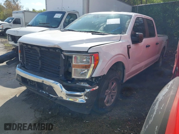 2021 Ford F-150 XL with VIN 1FTFW1E82MKD23506, listed as a IAAI auction lot 41876760 with 71,387 mi miles. Bid and sale history available at carsss.com. Image 2.