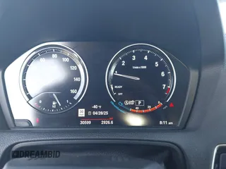 2020 BMW 2 Series 230i xDrive with VIN WBA2K1C08L7G28887, listed as a IAAI auction lot 42122785 with 30,599 mi miles and . Bid and sale history available at carsss.com. Image 7.