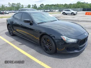 2018 Maserati Ghibli with VIN ZAM57XSA0J1301729, listed as a IAAI auction lot 42371157 with 101,730 mi miles and . Bid and sale history available at DreamBid. Image 1.