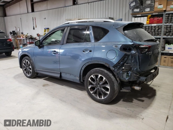 2016 Mazda CX-5 Grand Touring with VIN JM3KE4DY1G0714674, listed as a Copart auction lot 75516524 with 115,766 mi miles and Salvage Title. Bid and sale history available at carsss.com. Image 2.