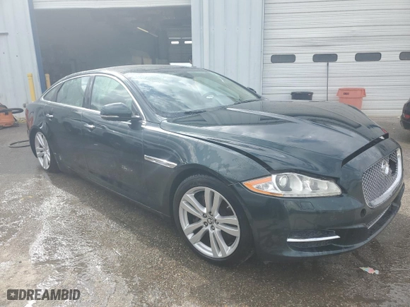 2011 Jaguar XJ with VIN SAJWA2GB2BLV01811, listed as a Copart auction lot 78380094 with 129,243 mi miles and Salvage Title. Bid and sale history available at carsss.com. Image 4.