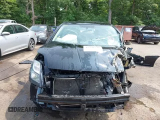 2012 Nissan Sentra S z VIN 3N1AB6AP7CL735517, wystawiony jako IAAI lot #42390746 z przebiegiem 141 203 mil mil oraz . Historia ofert i sprzedaży dostępna na DreamBid. Obrazek 12.
