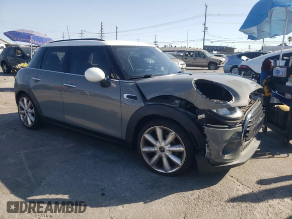2016 MINI Hardtop 4 Door with VIN WMWXU1C59G2D11117, listed as a Copart auction lot 65191715 with 121,633 mi miles and Salvage title. Bid and sale history available at DreamBid. Image 4.