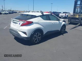 2019 Toyota C-HR XLE with VIN JTNKHMBX4K1040772, listed as a IAAI auction lot 41812031 with 79,729 mi miles. Bid and sale history available at carsss.com. Image 4.
