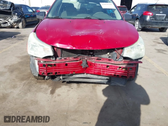 2011 Ford Focus S with VIN 1FAHP3EN9BW150196, listed as a IAAI auction lot 41858580 with 169,637 mi miles. Bid and sale history available at carsss.com. Image 6.