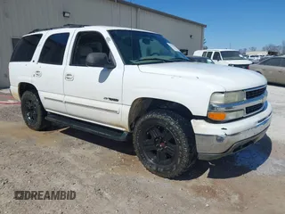 2001 Chevrolet Tahoe LS z VIN 1GNEC13T81R190806, wystawiony jako IAAI lot #41713506 z przebiegiem 367 617 mil mil oraz . Historia ofert i sprzedaży dostępna na DreamBid. Obrazek 1.