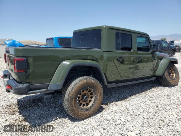 2023 Jeep Gladiator Rubicon с VIN 1C6JJTBM8PL515539, выставлен на аукционе Copart как лот 61076725 с пробегом 21 434 миль миль и Списание • Salvage title. История ставок и продаж доступна на DreamBid. Изображение 3.