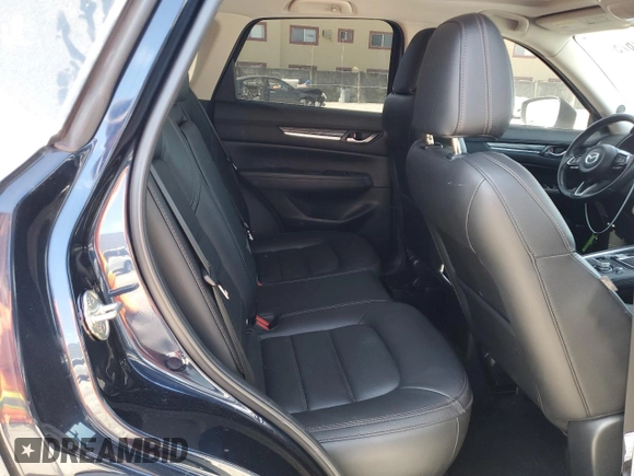 2021 Mazda CX-5 Grand Touring with VIN JM3KFBDM4M1462570, listed as a Copart auction lot 54827675 with 45,389 mi miles and Salvage Title. Bid and sale history available at DreamBid. Image 11.