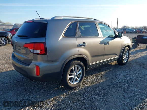 2014 Kia Sorento LX with VIN 5XYKT3A63EG503284, listed as a IAAI auction lot 41814383 with 166,219 mi miles and . Bid and sale history available at DreamBid. Image 4.