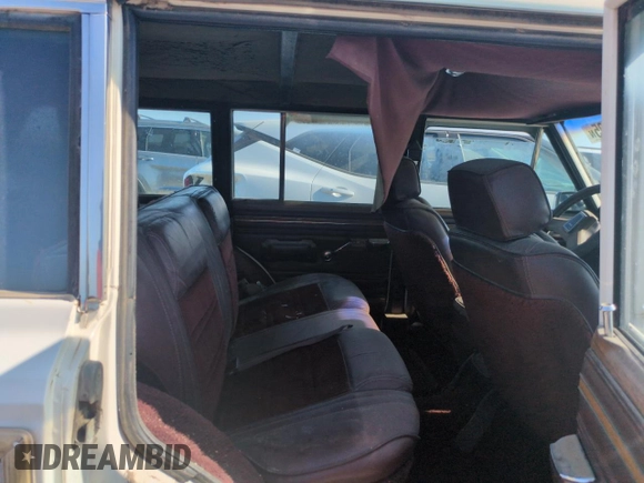 1987 Jeep Grand Wagoneer с VIN 1JCNJ15UXHT013691, выставлен на аукционе Copart как лот 59439595 с пробегом 174 941 миль миль и Чистый • Clean title. История ставок и продаж доступна на DreamBid. Изображение 10.