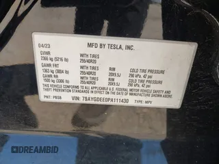 2023 Tesla Model Y Long Range with VIN 7SAYGDEE0PA111430, listed as a IAAI auction lot 42156924 with 35,950 mi miles and . Bid and sale history available at DreamBid. Image 9.