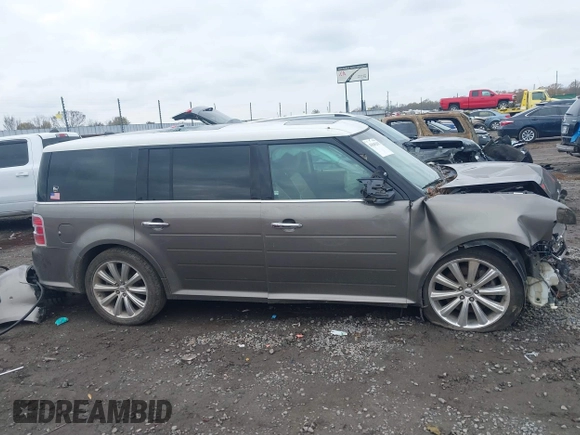 2013 Ford Flex Limited z VIN 2FMHK6DT2DBD14687, wystawiony jako IAAI lot #41045202 z przebiegiem Nie podano mil oraz . Historia ofert i sprzedaży dostępna na DreamBid. Obrazek 13.