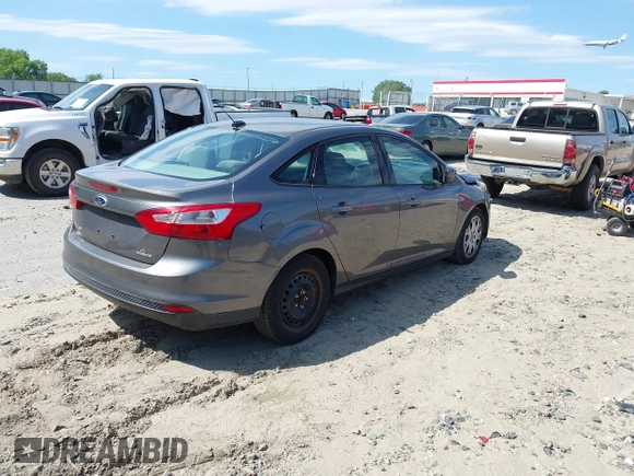 2012 Ford Focus SE with VIN 1FAHP3F22CL456552, listed as a IAAI auction lot 42341696 with 129,699 mi miles and . Bid and sale history available at DreamBid. Image 4.