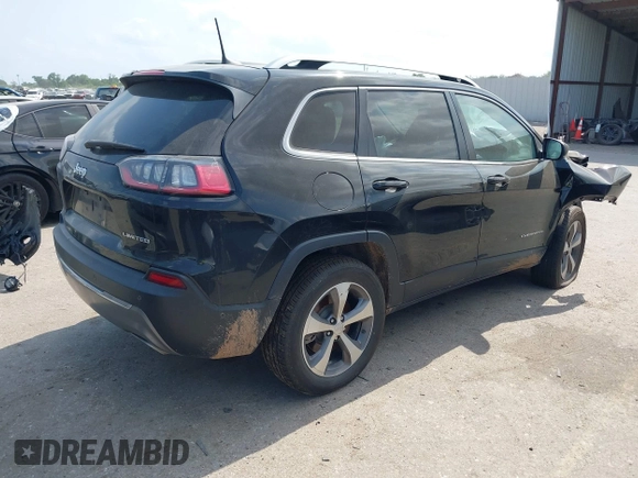 2021 Jeep Cherokee Limited with VIN 1C4PJLDX8MD183389, listed as a IAAI auction lot 42286478 with 93,677 mi miles and . Bid and sale history available at DreamBid. Image 4.