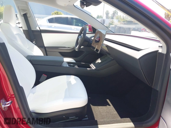 2025 Tesla Model 3 Long Range with VIN 5YJ3E1EA6SF917745, listed as a IAAI auction lot 42533673 with 7,305 mi miles and . Bid and sale history available at DreamBid. Image 5.