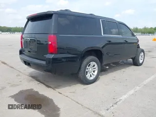 2019 Chevrolet Suburban LS with VIN 1GNSKGKC4KR128685, listed as a IAAI auction lot 42148721 with 92,346 mi miles and . Bid and sale history available at DreamBid. Image 4.