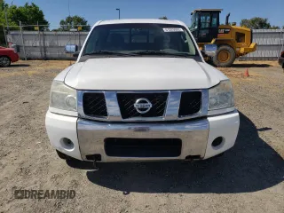 2004 Nissan Titan SE z VIN 1N6AA06A54N529628, wystawiony jako Copart lot #61020005 z przebiegiem 258 224 mil mil oraz Czysty tytuł • Clean title. Historia ofert i sprzedaży dostępna na DreamBid. Obrazek 5.