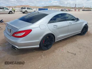 2014 Mercedes-Benz CLS-Class CLS 63 AMG S-Model with VIN WDDLJ7GB3EA104824, listed as a IAAI auction lot 41903353 with 76,706 mi miles. Bid and sale history available at carsss.com. Image 4.