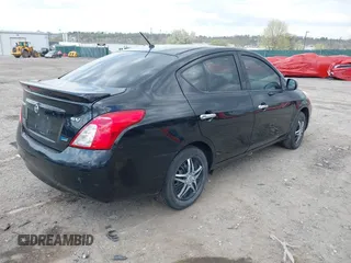 2014 Nissan Versa SV with VIN 3N1CN7AP7EL811097, listed as a IAAI auction lot 42051169 with 121,761 mi miles. Bid and sale history available at carsss.com. Image 4.