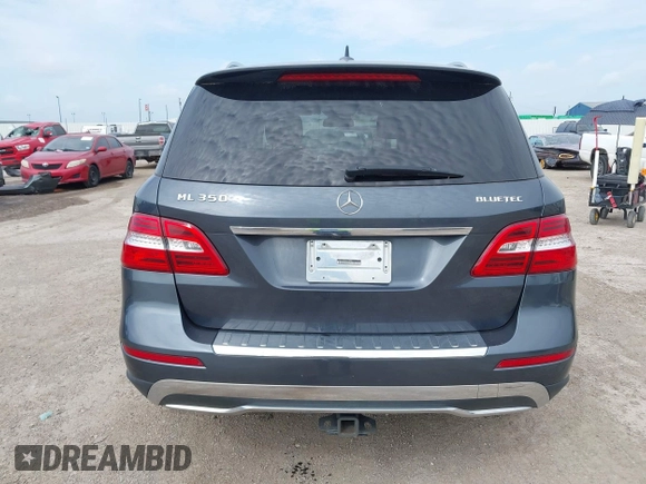 2014 Mercedes-Benz M 350 with VIN 4JGDA2EBXEA276400, listed as a IAAI auction lot 42430364 with 209,150 mi miles and . Bid and sale history available at DreamBid. Image 16.