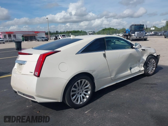 2014 Cadillac CTS Performance with VIN 1G6DC1E39E0132332, listed as a IAAI auction lot 42485811 with 109,899 mi miles and . Bid and sale history available at DreamBid. Image 4.