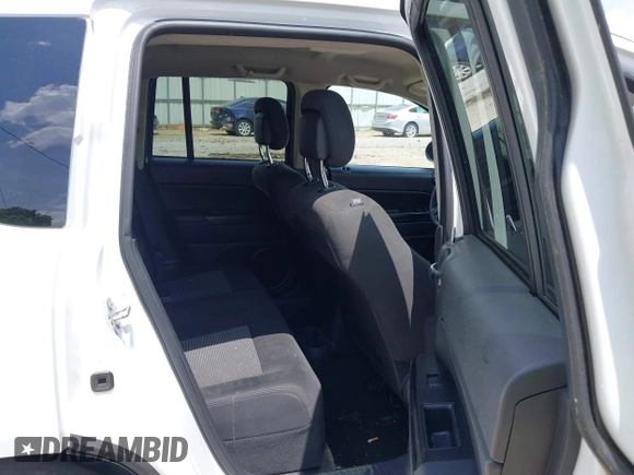 2016 Jeep Compass Sport with VIN 1C4NJCBA0GD742797, listed as a IAAI auction lot 42177186 with 128,665 mi miles and . Bid and sale history available at DreamBid. Image 8.