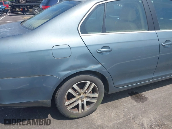 2006 Volkswagen Jetta 1.9L TDI z VIN 3VWST71K66M834544, wystawiony jako IAAI lot #42557527 z przebiegiem Nie podano mil oraz . Historia ofert i sprzedaży dostępna na DreamBid. Obrazek 6.