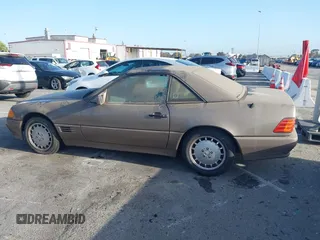 1992 Mercedes-Benz 500 с VIN WDBFA66EXNF055989, выставлен на аукционе IAAI как лот 41949478 с пробегом 123 283 миль миль и . История ставок и продаж доступна на DreamBid. Изображение 14.