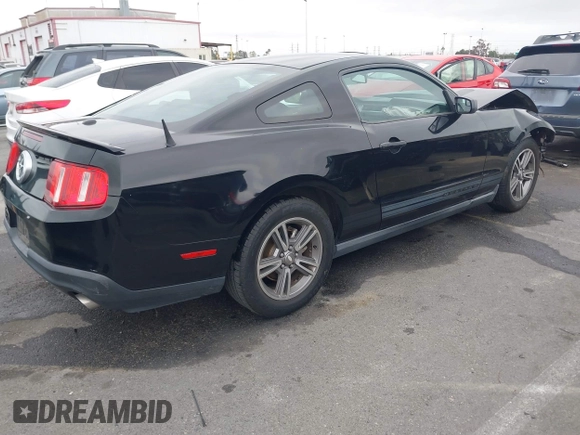 2011 Ford Mustang V6 with VIN 1ZVBP8AM9B5103778, listed as a IAAI auction lot 42065508 with 108,422 mi miles and . Bid and sale history available at DreamBid. Image 4.