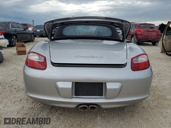 2007 Porsche Boxster S z VIN WP0CB29857U730730, wystawiony jako Copart lot #74175794 z przebiegiem Nie podano mil oraz Szkoda całkowita • Salvage title. Historia ofert i sprzedaży dostępna na DreamBid. Obrazek 6.
