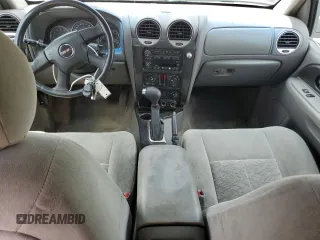 2005 GMC Envoy SLE z VIN 1GKDT13S752203494, wystawiony jako Copart lot #56150605 z przebiegiem 243 475 mil mil oraz Szkody całkowita. Historia ofert i sprzedaży dostępna na DreamBid. Obrazek 8.