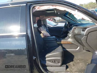 2018 Chevrolet Suburban LT with VIN 1GNSKHKCXJR268938, listed as a IAAI auction lot 41672886 with 76,844 mi miles and . Bid and sale history available at DreamBid. Image 5.