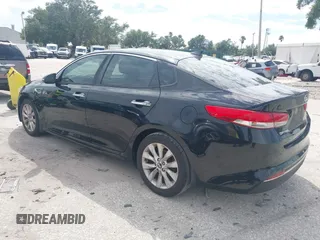 2017 Kia Optima EX with VIN 5XXGU4L35HG164578, listed as a IAAI auction lot 42646046 with 71,113 mi miles and . Bid and sale history available at DreamBid. Image 3.