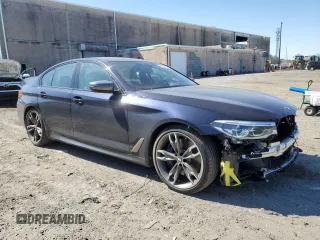 2020 BMW 5 Series M550i xDrive z VIN WBAJS7C02LCD42698, wystawiony jako Copart lot #48229785 z przebiegiem 51 896 mil mil oraz Szkoda całkowita • Salvage title. Historia ofert i sprzedaży dostępna na DreamBid. Obrazek 4.